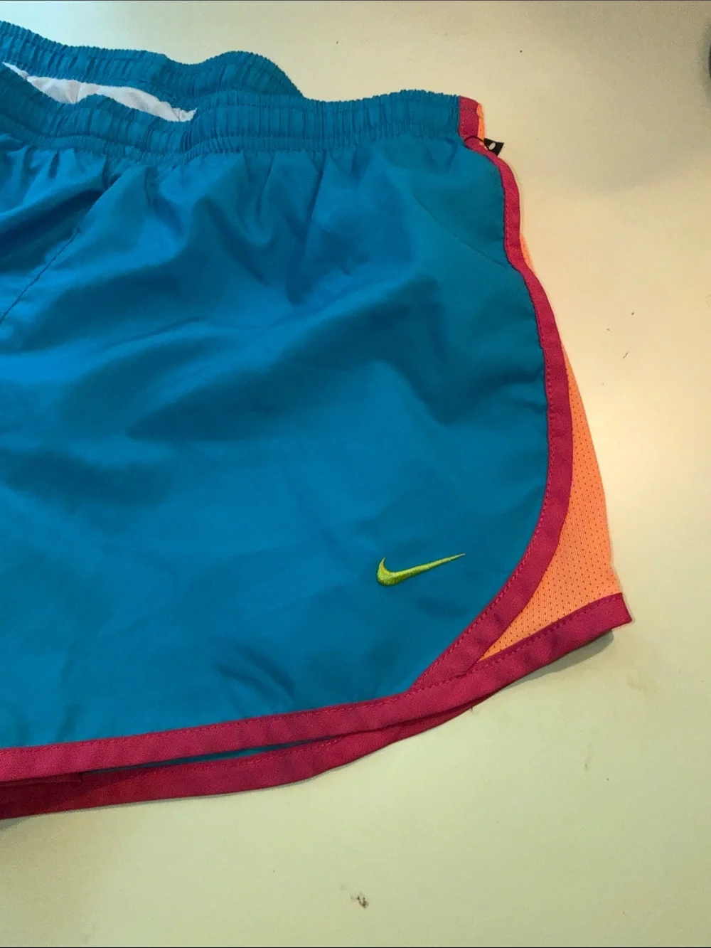 Nike Women’s Turquoise Athletic Shorts with Pink Trim